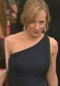 Amy Ryan in navy blue Calvin klein / one shouldered blah