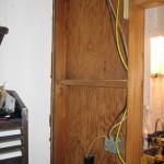 destruction-day2-1 The rerouted wiring behind the kitchen wall.